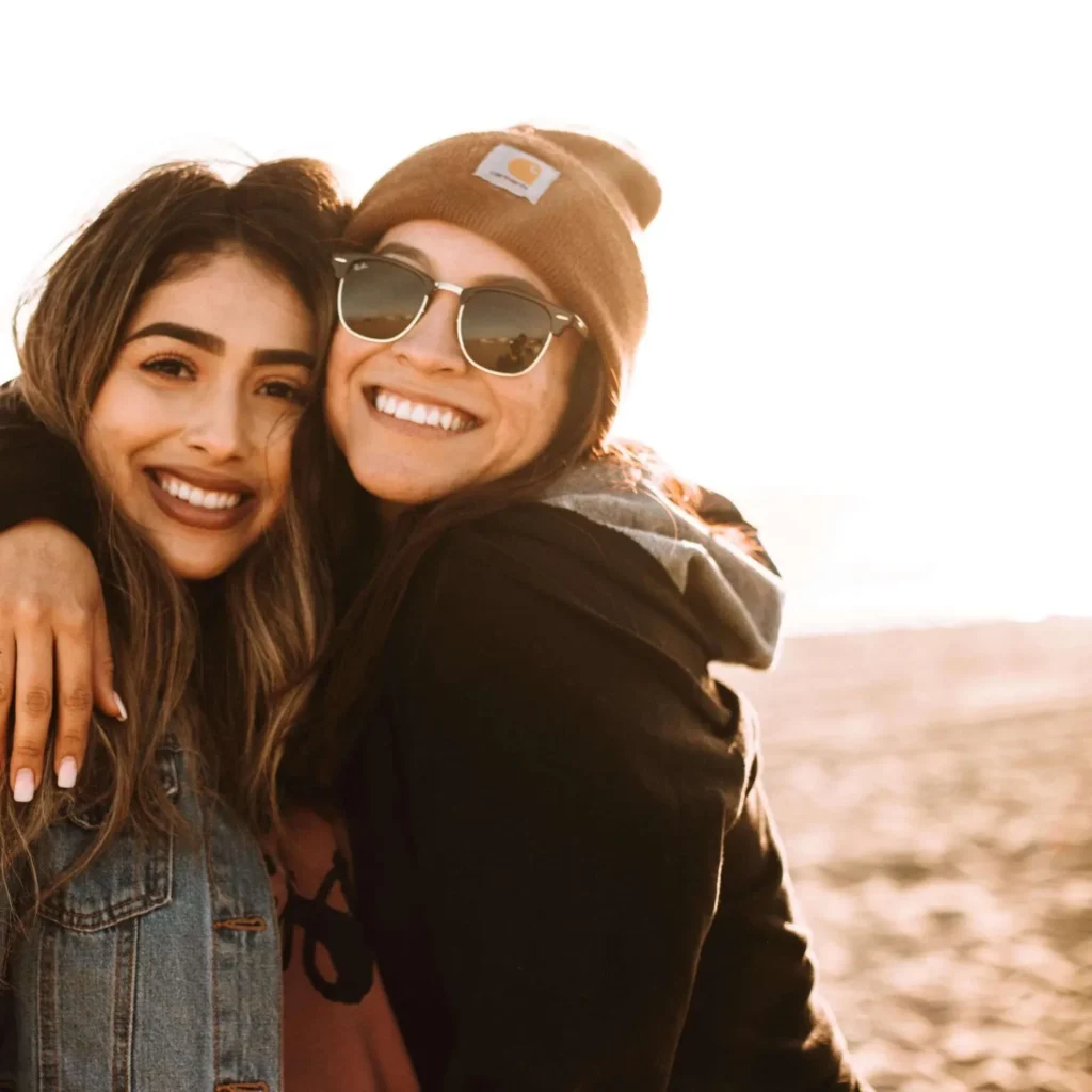 photo of two young adult females from our program on the beach in Treasure Island Florida